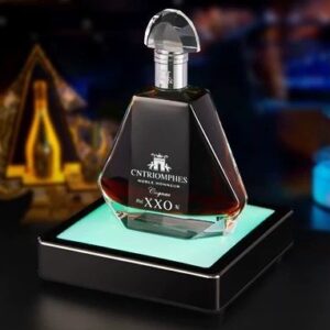 An LED-illuminated square bottle serving stand