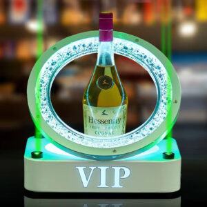 A VIP drink display base featuring color-changing LED lights and a laser effect
