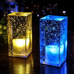 A crystal cube LED table lamp featuring internal bubble effects